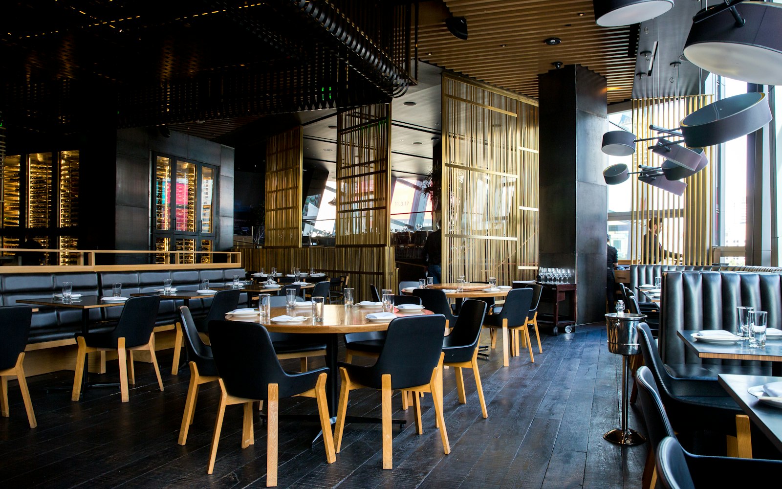 The dining room laid up and lit low before service